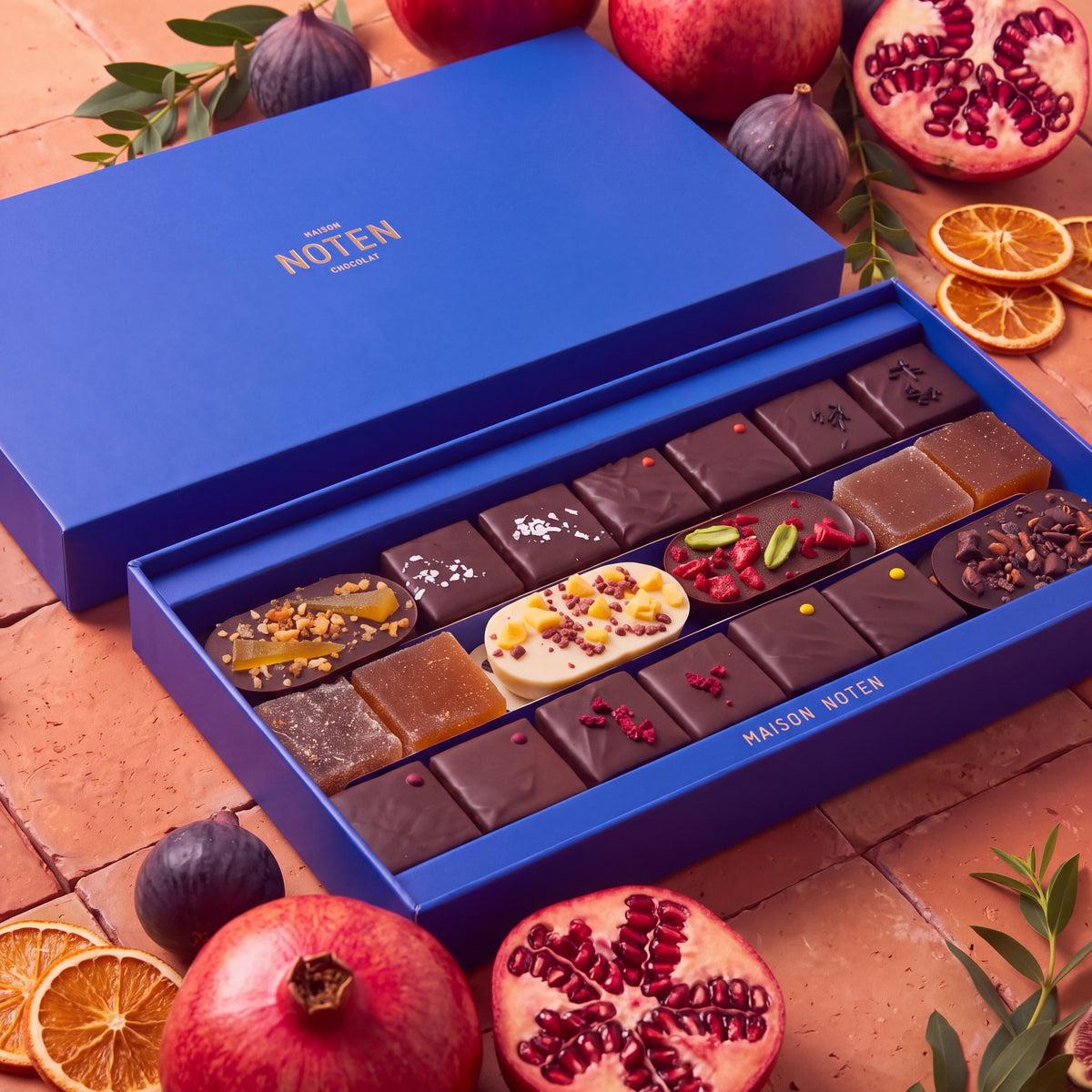 Angled view of the Rosh Hashanah Prestige Box with assorted vegan chocolates and fruit confections